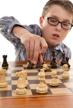 A young chess player making a smart move