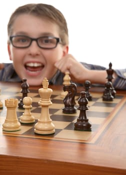 Chess player celebrates a tactical win. Checkmate.   Focus to foreground
