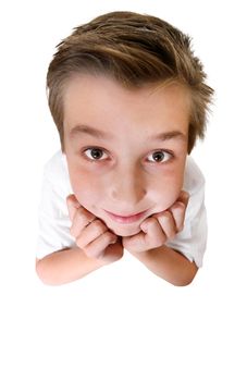 Comical boy with a big head looking up. Focus is to the boys face only.