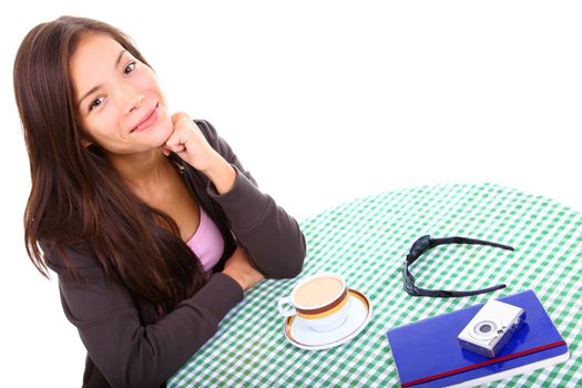 Woman at cafe isolated on white background. Beautiful mixed race asian / caucasian model.