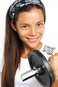 Fitness woman. Attractive woman lifting weights and smiling at the camera. Closeup.
