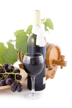 Red wine bottle, glass and cask with grapes over white