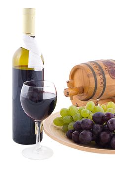 Red wine bottle, glass and cask with grapes over white