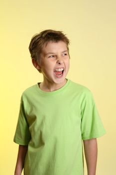 A child lets out an angry scream or shout
