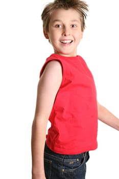 Happy smiling boy jumping into the air-  side view, white background