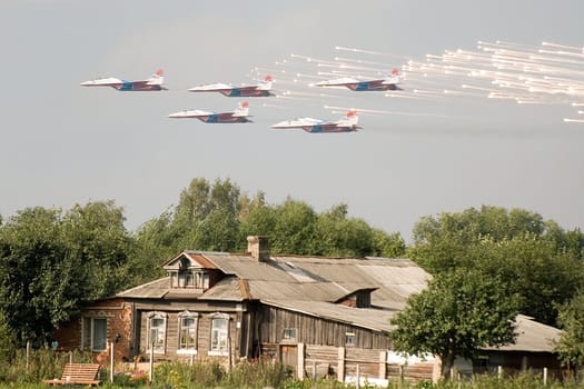 Russian contrasts.  Slum dwelling and morden military plains (Aviation show in Zhukovskiy).