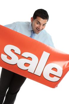 A happy salesman, businessman or other marketing person holding a vinyl sale banner.  White background.