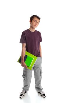 Young male teen school student wearing t-shirt and cargoes.  He is carrying textbook and folder.  