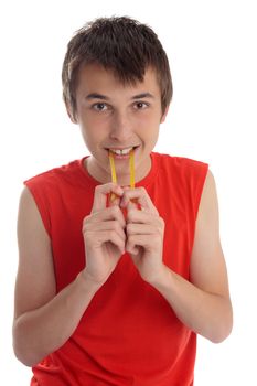 A boy enjoys a soft fruit flavoured jelly snake.