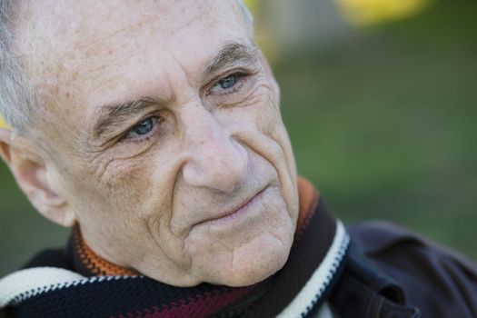 Portrait Of An Old Man Looking Away From Camera