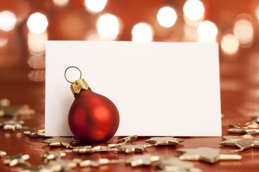 Christmas decoration with blank card. Selective focus, aRGB.