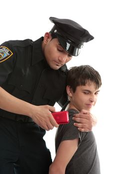 A policeman with a male juvenile delinquent that has stolen an electronic device. item