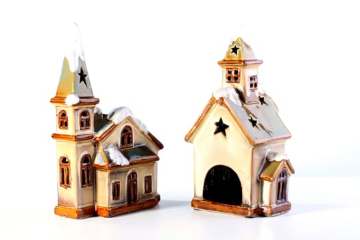 Ceramic houses for a dwelling ornament on Christmas and New Year.