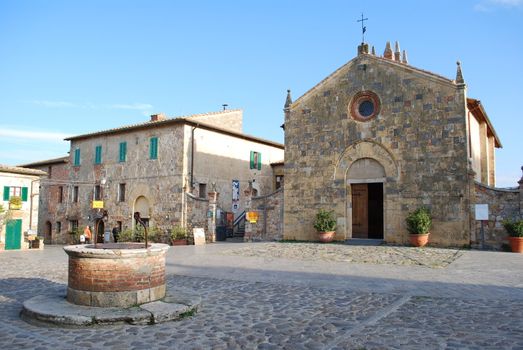 Town-walls of Monteriggioni medieval village completely encircled from circular walls with 14 towers. Siena Tuscany Italy