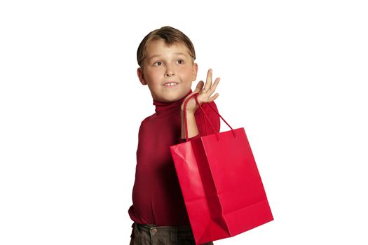 Child with shopping bag.  eg christmas shopping, gifts, bargains