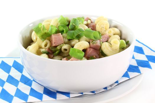 a white bowl of Munich ham pasta