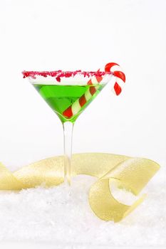 Christmas Party - Green drink with red edge and curling gold ribbon on white. - vertical