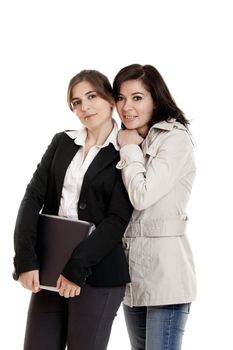 Two female young students over a white background