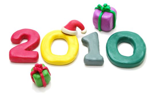 3D New Year Text 2010 Made of Colored Plasticine with Gifts Isolated on White Background