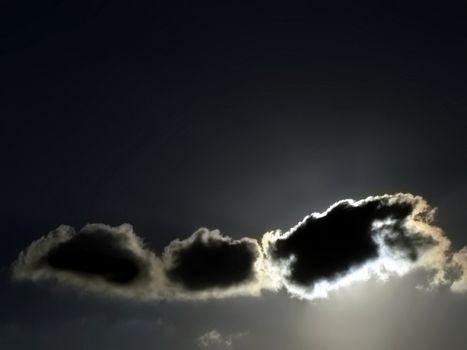 Clouds looming over the horizon with deep blue sky in background