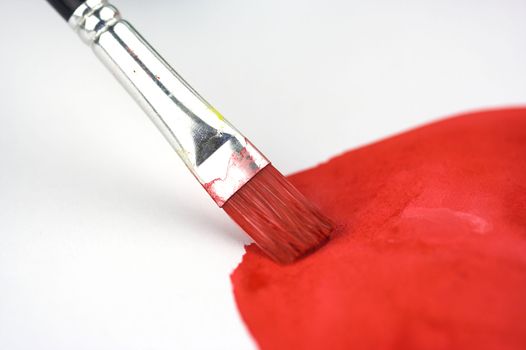 A brush paint in red