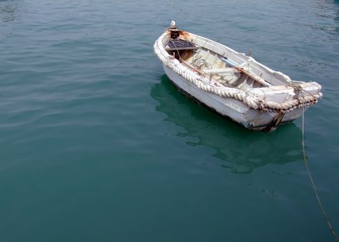 Old and battered fishing boatl, in Malta