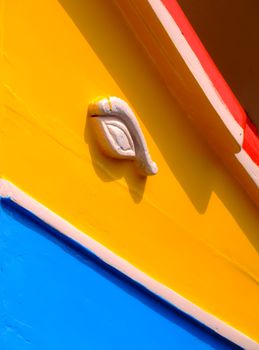 Traditional colors and eyes found on the traditional Malta fishing boats, commonly known as luzzu or dghajsa. The eyes are said to come down from Phoenician and Egyptian times.