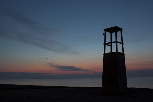  of life-guard's cabin at sunrise