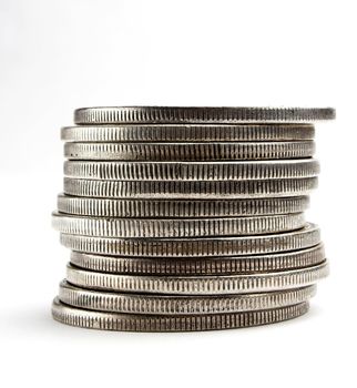 Stack of old dollars and coins