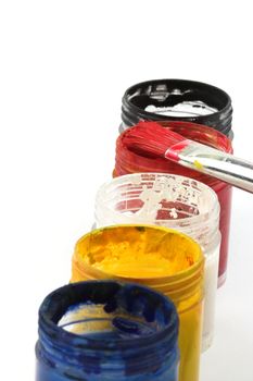 Painter workplace,paints and brushes close up