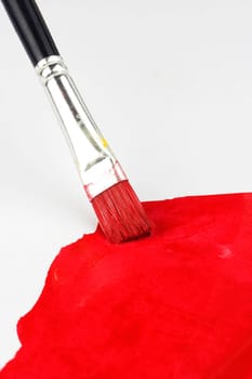 A brush paint in red