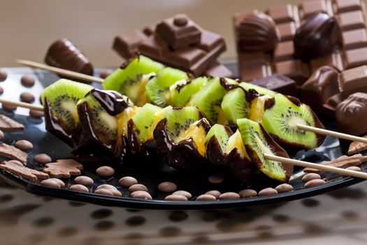 fruit skewers and chocolate candies