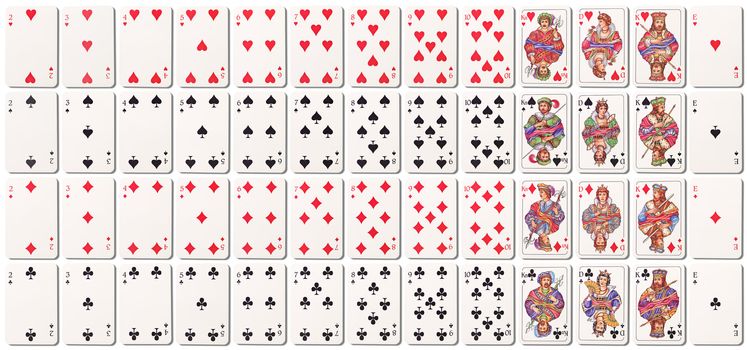 Full deck of cards lined up on rows isolated on white