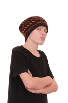 The teenager in a black vest and a hat isolated on white background