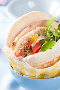 Pita bread filled with tuna, tomato, apricot and yogurt