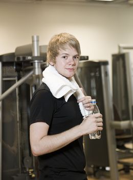 Portrait of a young man at a fitness center