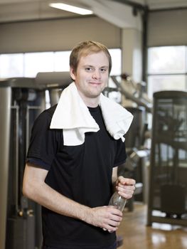 Portrait of a young man at a fitness center