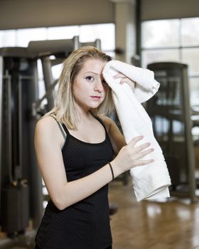 Portrait of a young woman at the gym