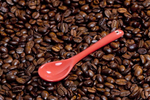 teaspoon with coffee beans