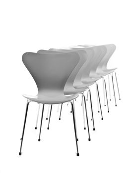 Chairs in a row isolated on a white background