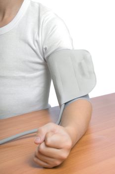 Patient is measuring blood pressure  isolated over white 