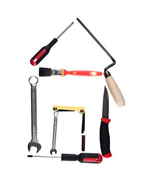 House made of tools isolated on a white background