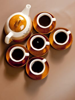 still life of coffee cups and coffeepot