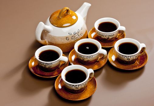 still life of coffee cups and coffeepot