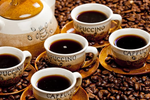 still life of coffee cups and coffeepot