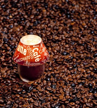 still life of candle and coffee beans