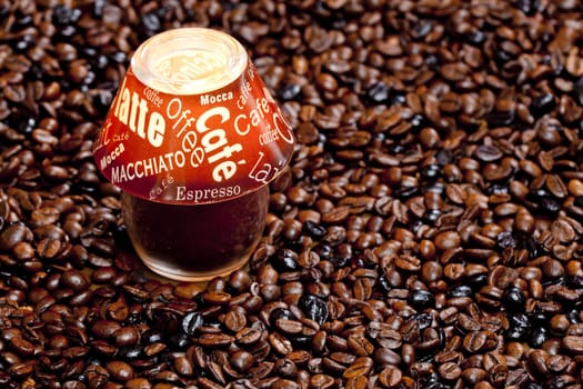 still life of candle and coffee beans