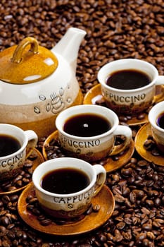 still life of coffee cups and coffeepot