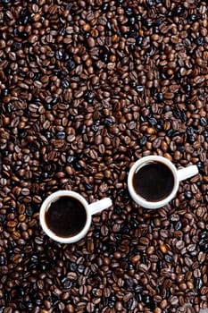 still life of coffee cups and coffee beans