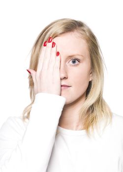 Young woman covering her face isolated a white background